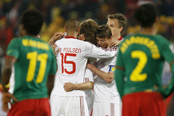World Cup day 10: Denmark's players players celebrate Rommedahl's goal