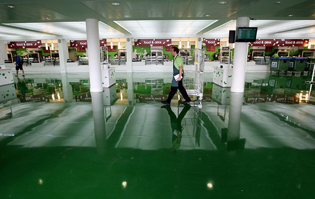 Wimbledon day one: Workers in the empty food court