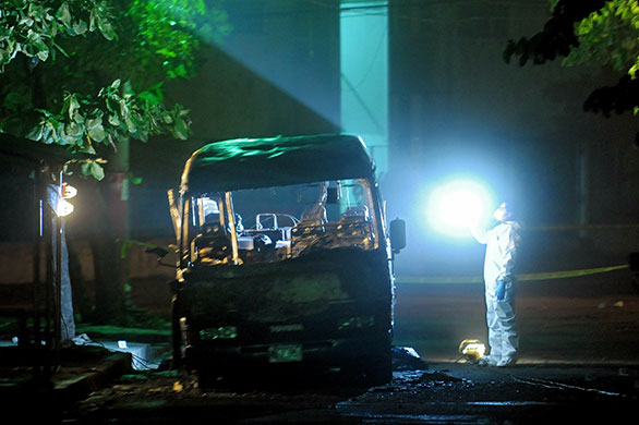 24 hours in pictures: Mara 18 arson attack in El Salvador