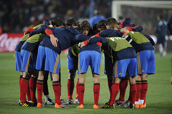Spain v Honduras: Spanish players huddle before kick-off