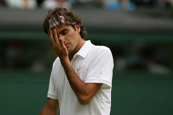 tennis: Swiss Federer Roger Federer reacts to pl