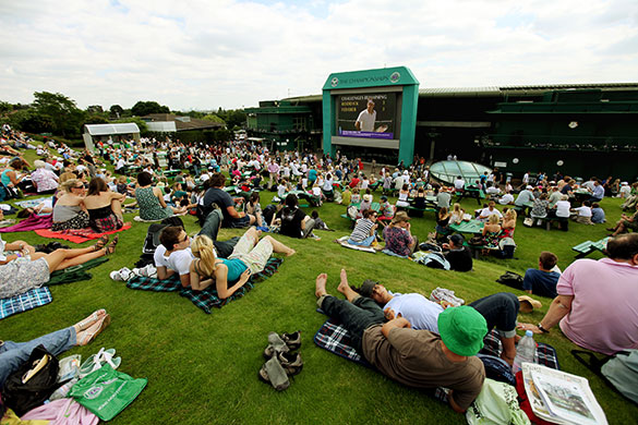 24 hours in pictures: Wimbledon, UK: The sun shines on the first day of the tennis championships