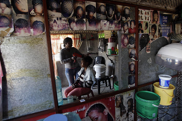 24 hours in pictures: Rustenburg, South Africa: A beauty salon near the Royal Bafokeng Stadium