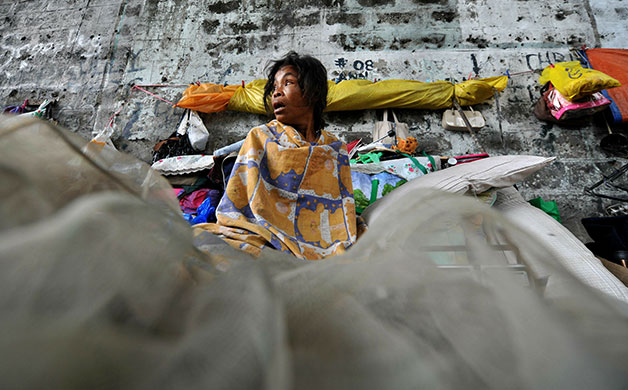 24 hours in pictures: Manila, Philippines: A mother of three