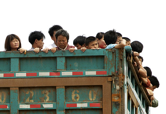 24 hours in pictures: Fuzhou, China: Villagers are evacuated to safer areas after flooding