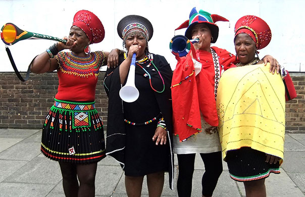 Fans network Flickr: Fans flickr: Women blowing vuvuzelas in Brixton, London