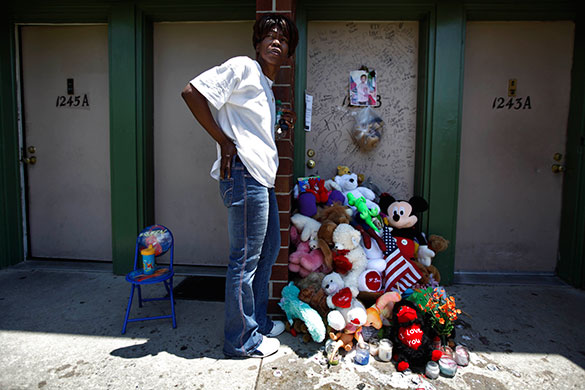 24 hours in pictures: makeshift memorial for shooting victim, 2 year old Terrence Webster