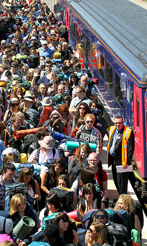 Glastonbury: Festival goers at the train station