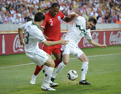 Slovenia versus England: Glen Johnson takes on the Slovenians