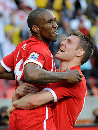 Slovenia versus England: Jermain Defoe and James Milner celebrate Defoe's goal