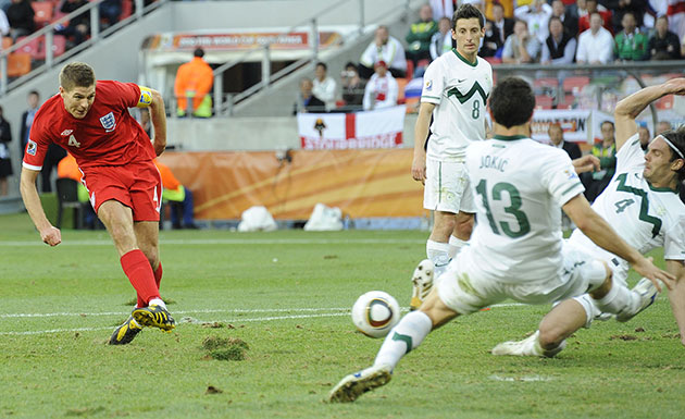 Slovenia versus England: Steven Gerrrard puts in a shot