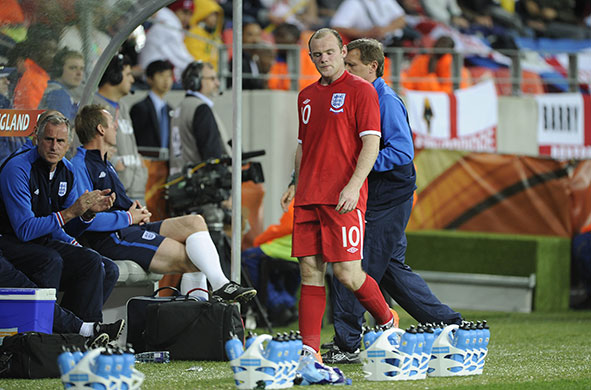 Slovenia v England: Wayne Rooney is dejected after being subbed