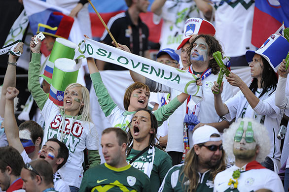 Slovenia v England: The Slovenian fans show off their singing vocies before the game