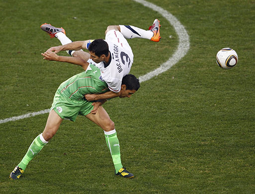 rest of today: Algeria's Matmour fights for the ball with United States' Bocanegra 