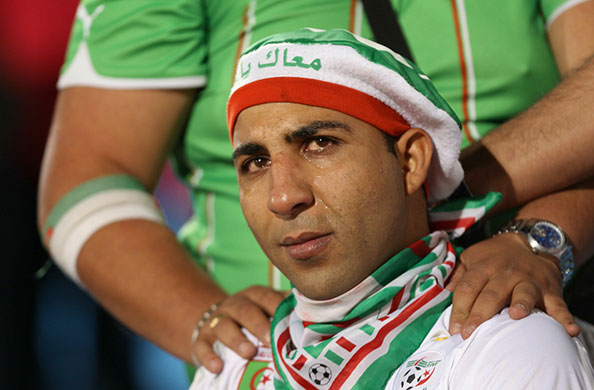 rest of today: Dejected Algeria fan