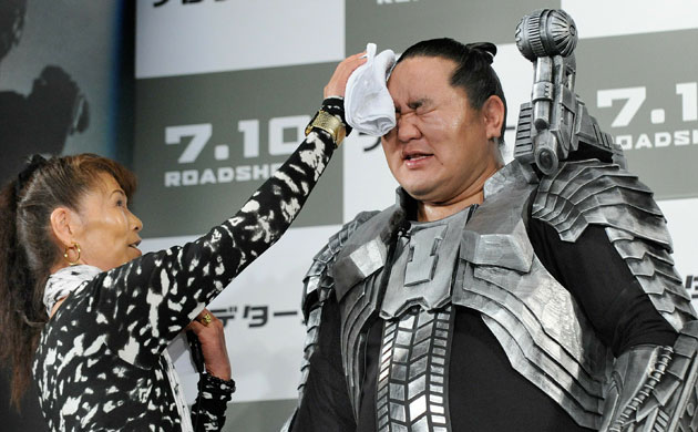 Week in film June 25: The MC (L) wipes sweat of Mongolian-born