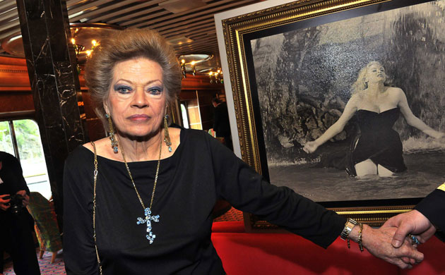 Week in film June 25: Actress Ekberg is pictured during a news