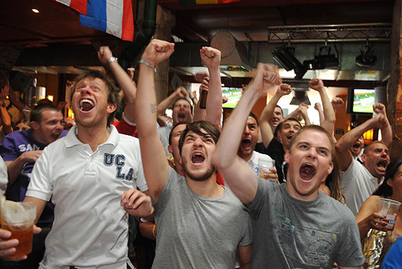 England fans: Liverpool, UK: England fans watch the World cup match