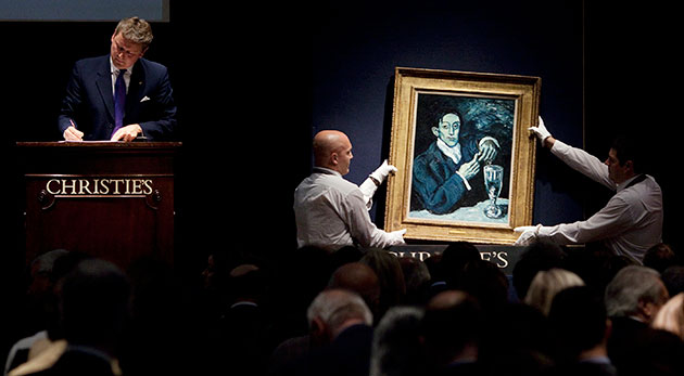 Sotheby's and Christie's: Auctioneer takes bids  on Pablo Picasso at Christie's