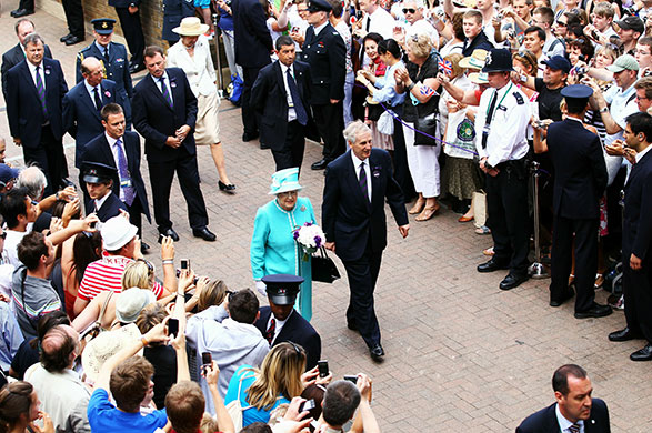 The Queen at Wimbledon: People take pictures of the Queen during her visit