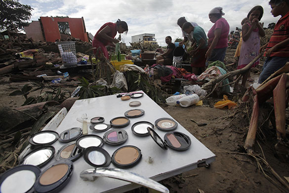 Brazil floods: Residents gather near destroyed houses in Uniao dos Palmares city