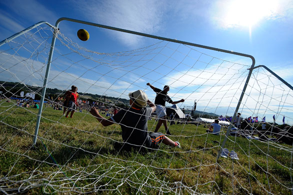 Glastonbury 2010: Kids play football at Glastonbury