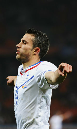 World Cup Day 14: Robin Van Persie celebrates after opening the scoring