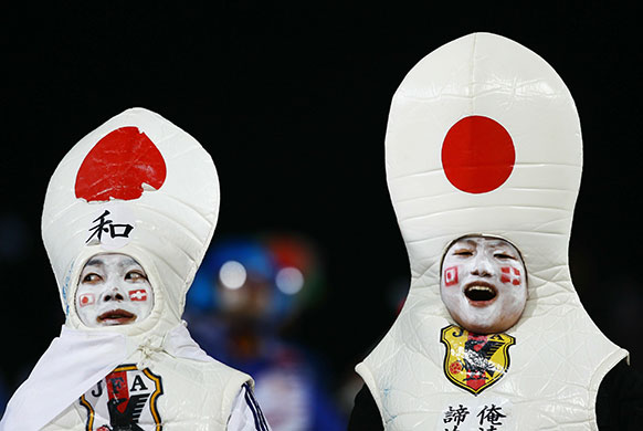 World Cup Day 14: Japanese fans cheer on their team against Denmark