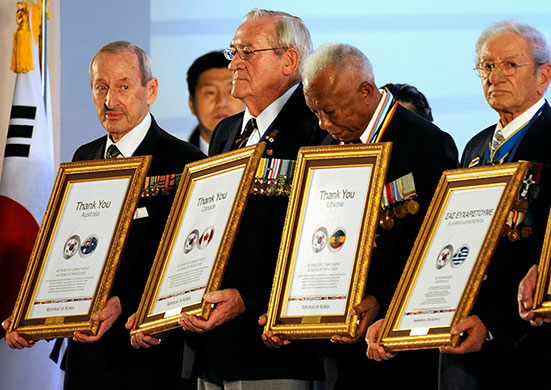 Korean War anniversary: War veterans hold citations from the South Korean President 