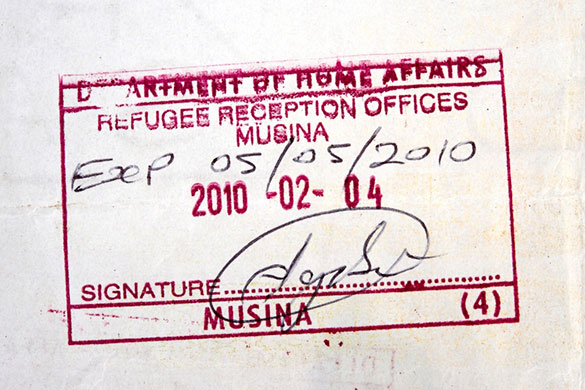 Musina: refugee paperwork stamp