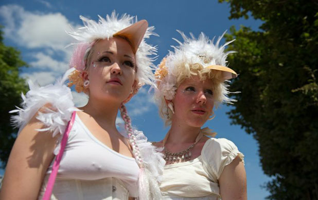 Glasto day three: Revellers in costume pose at Glastonbury