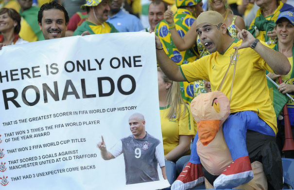 sport: A Brazil supporter cheers prior to the s