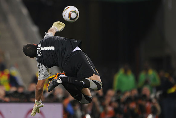 sport: Portugal's goalkeeper Eduardo gets the b