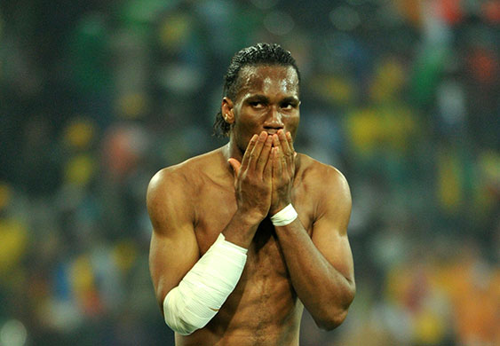 sport: Ivory Coast's striker Didier Drogba reac