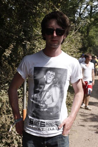 t-shirts: Man wearing a Bruce Springsteen t-shirt at Glastonbury