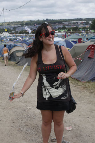 t-shirts: Girl wearing a Joy Division t-shirt at Glastonbury