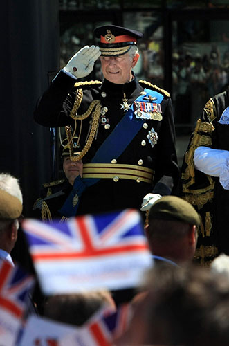 Armed Forces Day: The Prince of Wales takes the salute during the parade through Cardiff