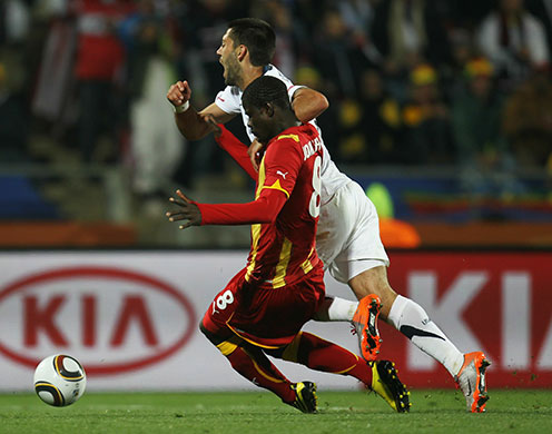 Knockout stages day 1: Jonathan Mensah brings down Clint Dempsey and gives away a penalty