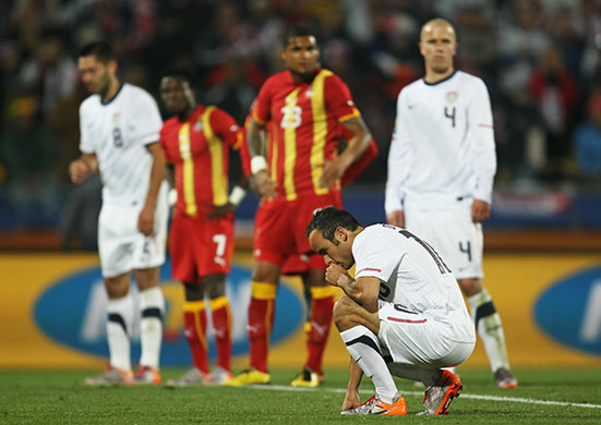 Knockout stages day 1: Landon Donovan composes himself before taking a penalty