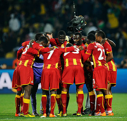 Knockout stages day 1: The Ghana team huddle at half-time