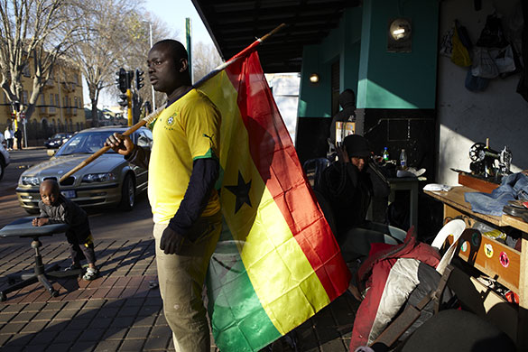 African fans in Jo'burg: A Ghanaian fan stands proudly with his flag