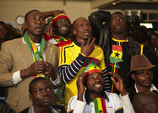 African fans in Jo'burg: Pensive Ghanaian fans watch the match