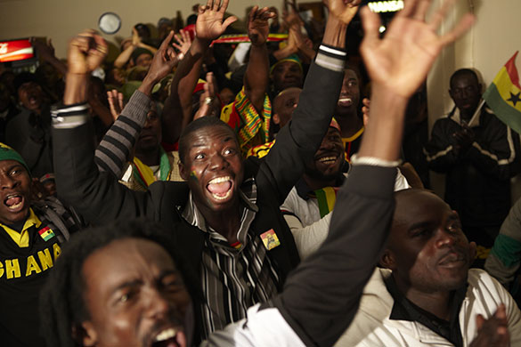 African fans in Jo'burg: Ghanain fans cheer when Gyan equalises for the Black Stars