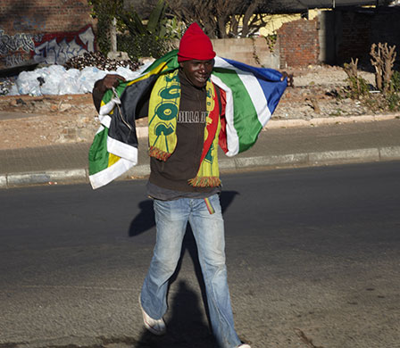 African fans in Jo'burg: A Bafana Bafana supporter from Zimbabwe shows his colours 