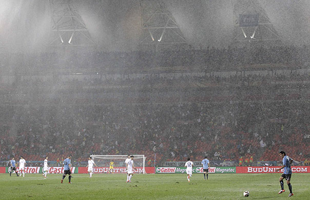 Knockout stages day 1: Heavy rain at the Uruguay v South Korea match