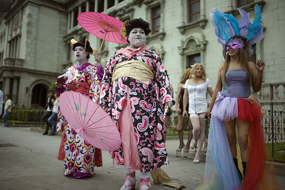 24 hours in pictures: Guatemala City, Guatemala: Transsexuals gather during the Gay Pride parade