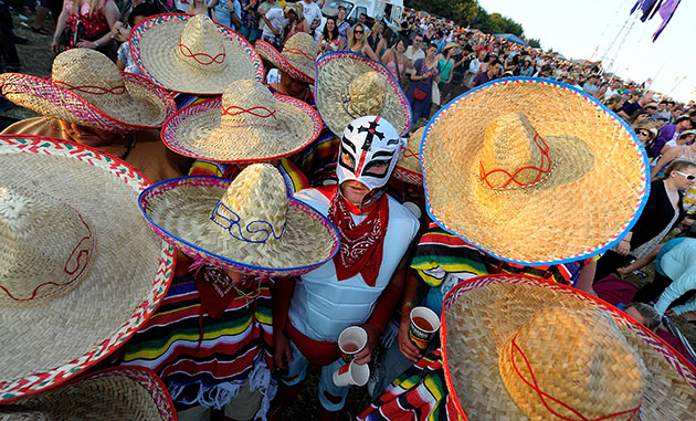 24 hours in pictures: Glastonbury, UK: Revelers enjoy party atmosphere