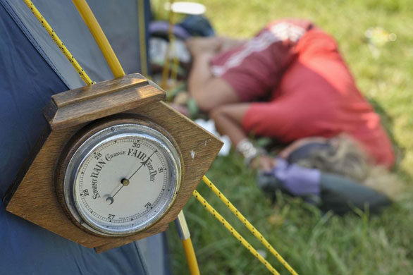 Heat: A barometer hangs on a tent indicating dry weather as temperatures soar