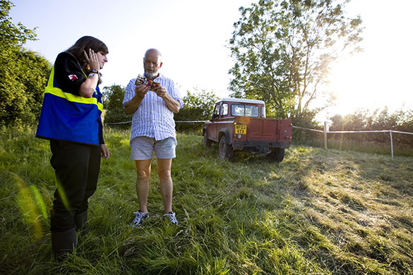 Eavis at Glastonbury: Michael Eavis drives around the outside of the fence