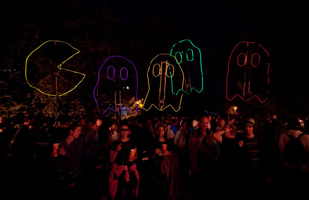 Glastonbury by night: Pac-man chases his prey through the streets of Shangri-La
